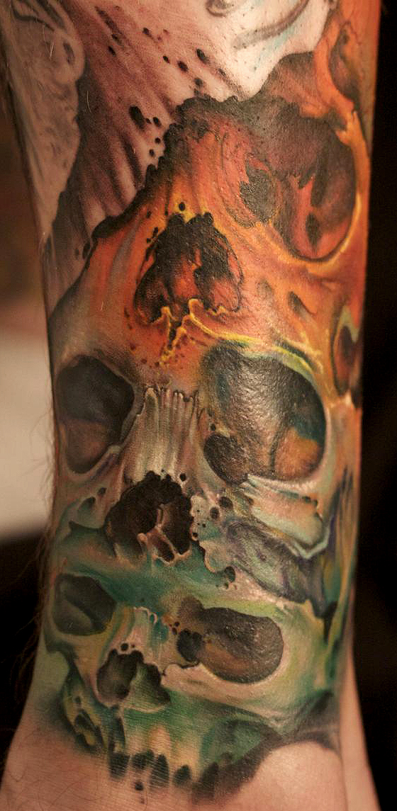 skull sleeve tattoos. Tattoo by Jeff Gogue